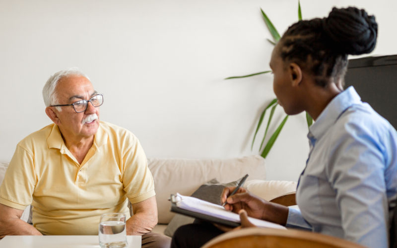 Geriatric psychiatrist and patient in session